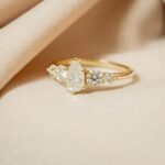 Moissanite Five-Stone Ring – Pear Center, 14K Light Gold Plated 925 Sterling Silver - Image 3